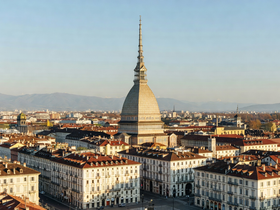 View of the towering Mole Antonelliana spire rising above Turin city center